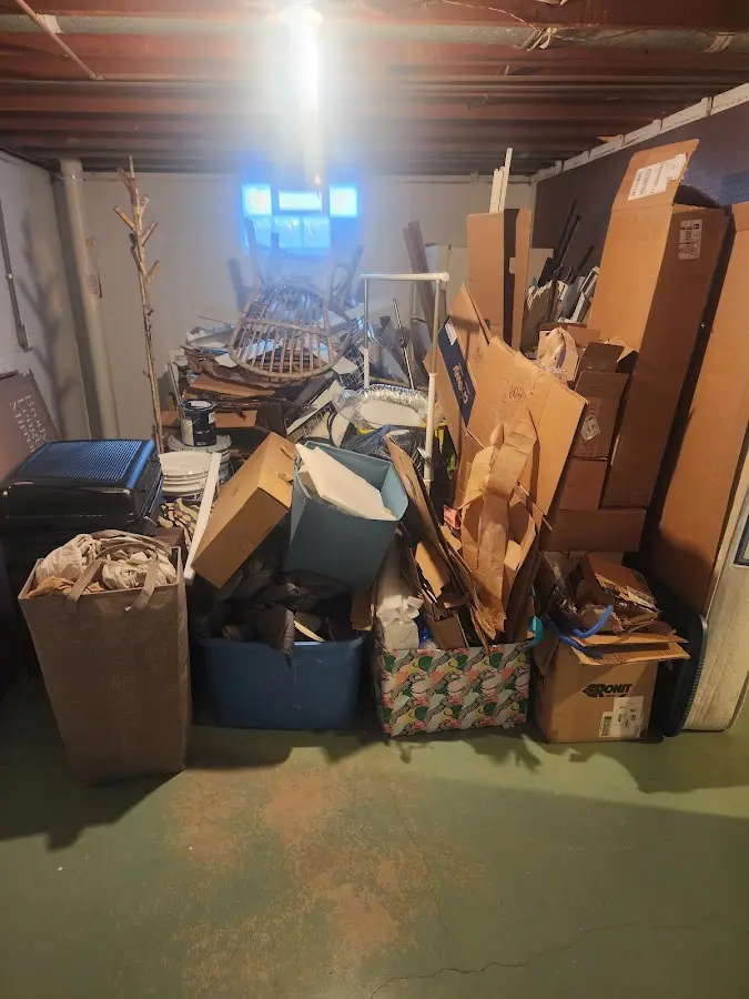 Roll-off dumpster container at job site for 4 Yard Dumpster Rental in Oak Ridge